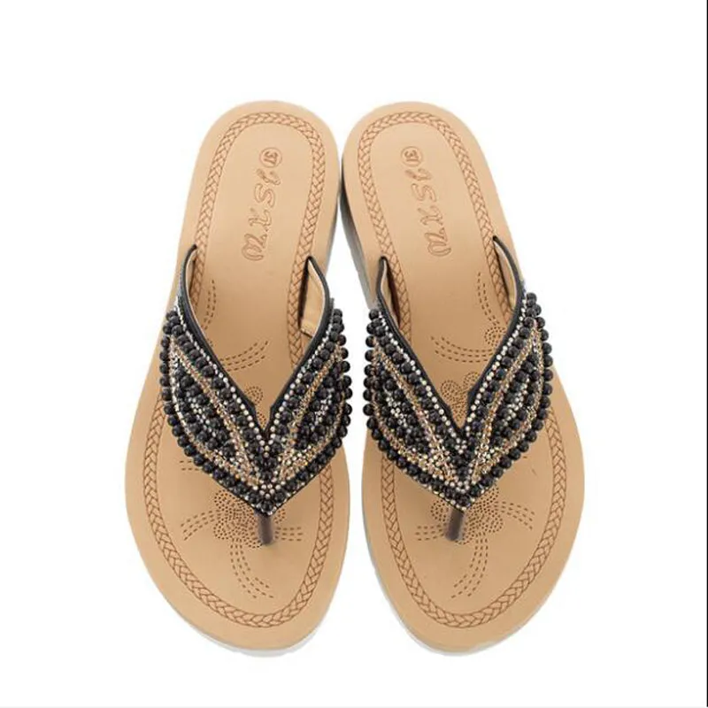 Nanccy Rhinestone Eye Personality Pearl Slippers