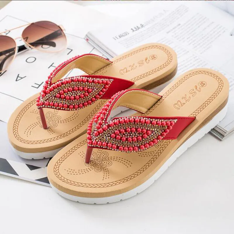 Nanccy Rhinestone Eye Personality Pearl Slippers