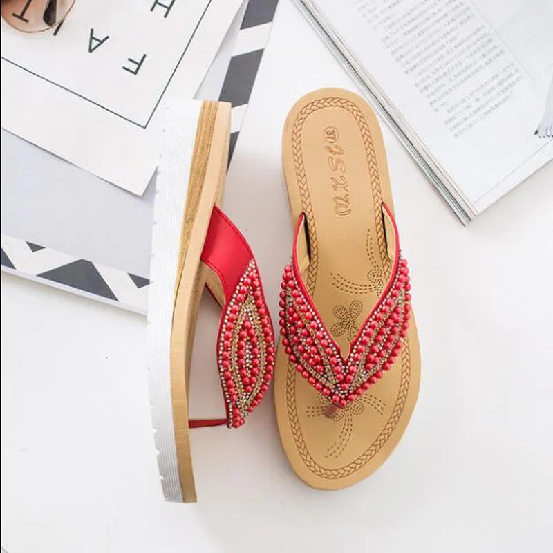 Nanccy Rhinestone Eye Personality Pearl Slippers