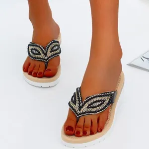 Nanccy Rhinestone Eye Personality Pearl Slippers