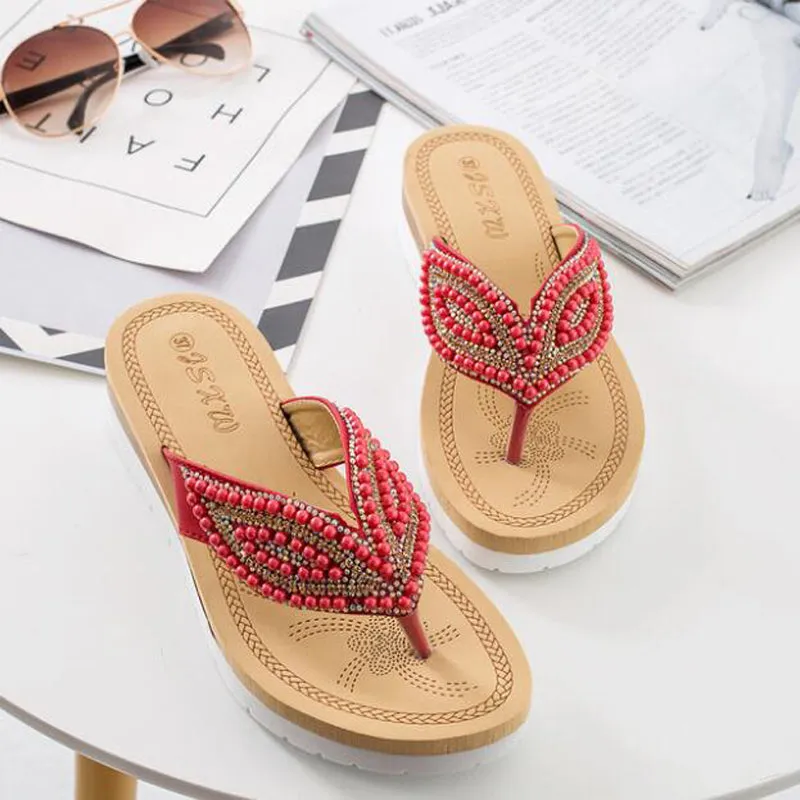 Nanccy Rhinestone Eye Personality Pearl Slippers