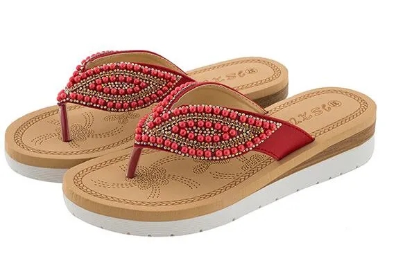 Nanccy Rhinestone Eye Personality Pearl Slippers