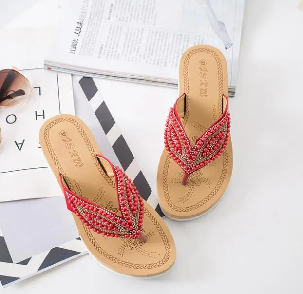 Nanccy Rhinestone Eye Personality Pearl Slippers